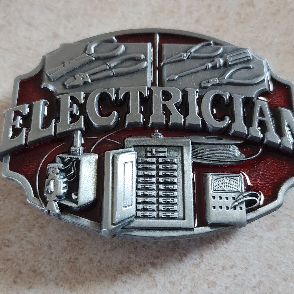 New electrician silver detailed belt Buckle approximately 3.5" wide